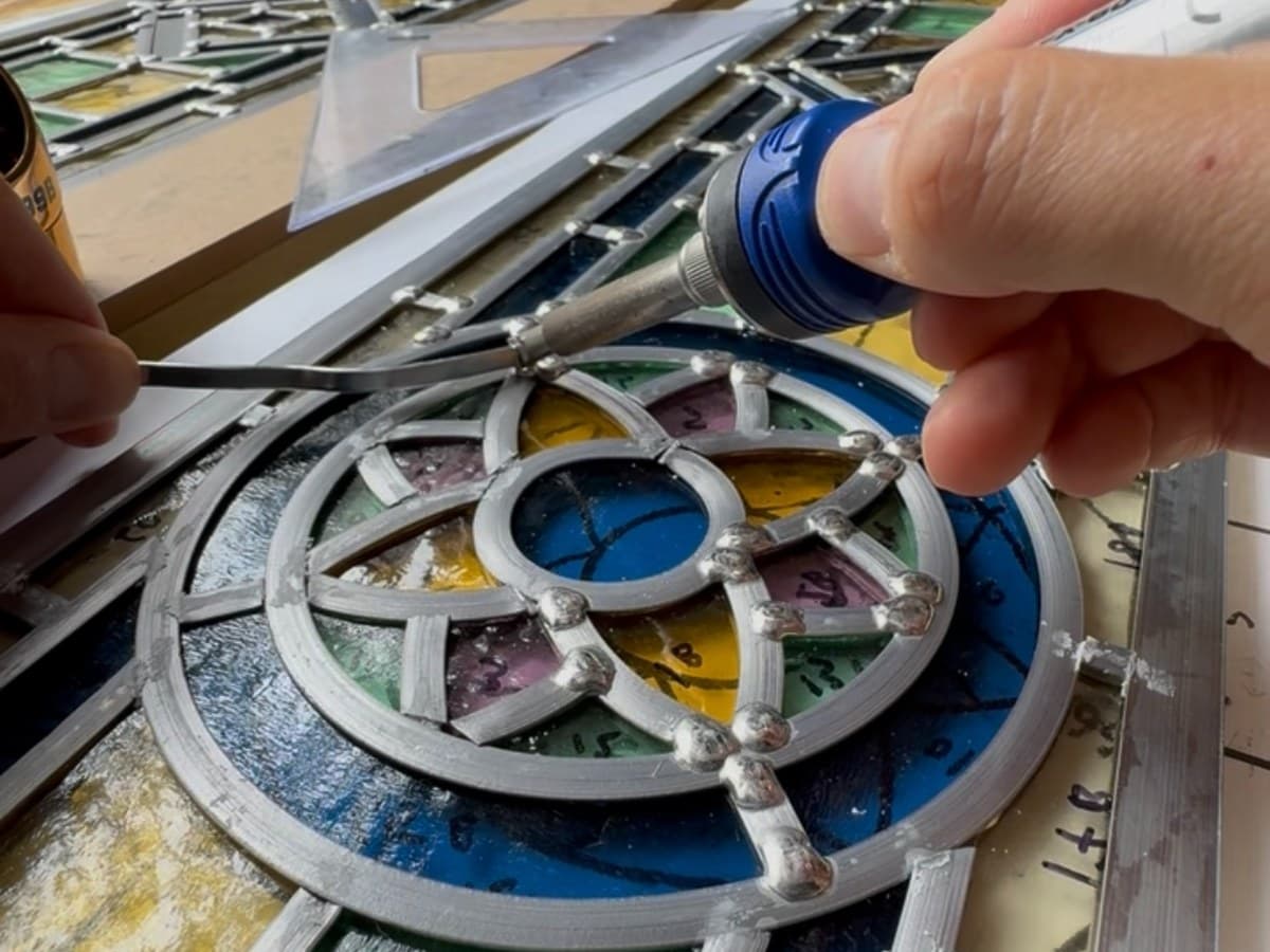 Soldering each lead joint